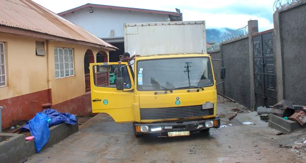 The delivery truck arriving at the Hastings yard