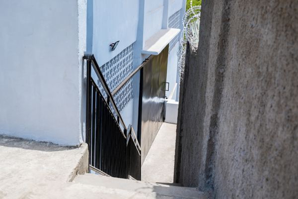 Stairs down to the side entrance