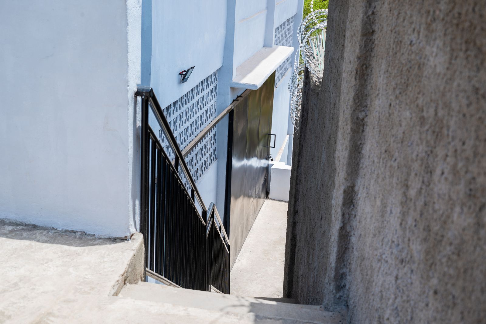 Stairs down to the side entrance