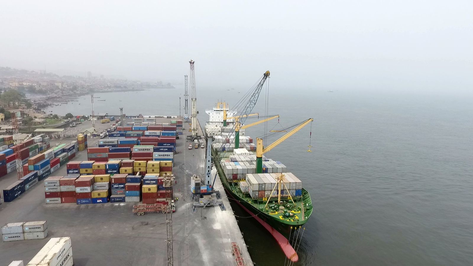 A container ship berthed alongside the quay