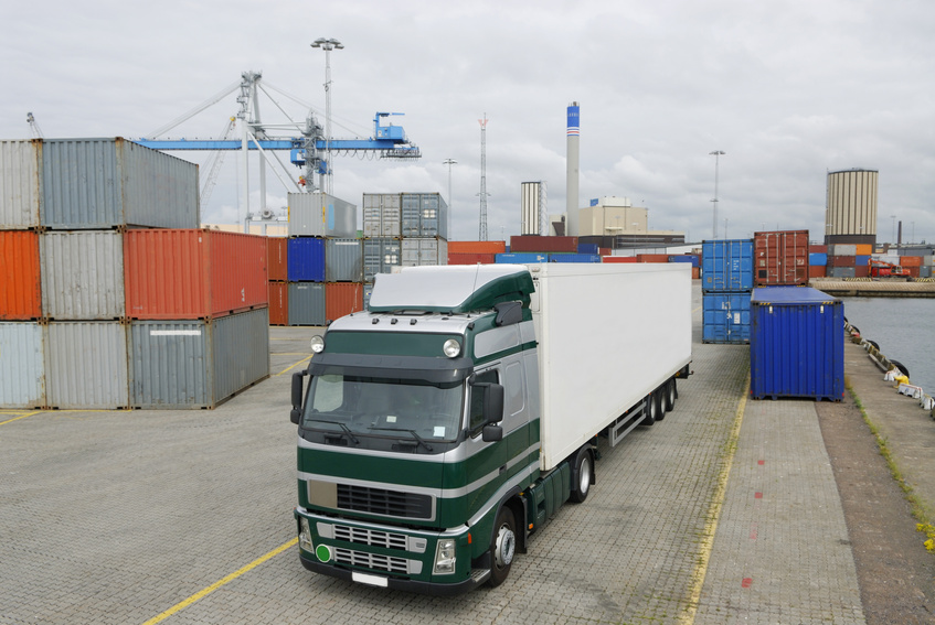 truck with shipping container at port